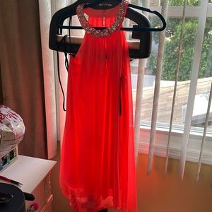 Bright pink flowy dress. jeweled haltered neck line